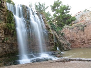 Beautiful photo of a waterfall with a lot of fresh water and clear.