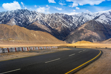Landscape view during a road trip with snow mountains on the background in Ladakh, Jammu and Kashmir, North India