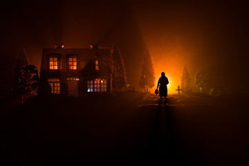 Fototapeta premium Diffuse entities walking on a street from an old European cemetery in moonlit night