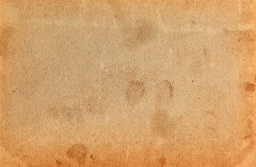 Old paper textured background. Brown color wallpaper template