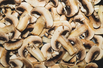 Sliced mushrooms. background with champignons. healthy food. vegetarian nutrition