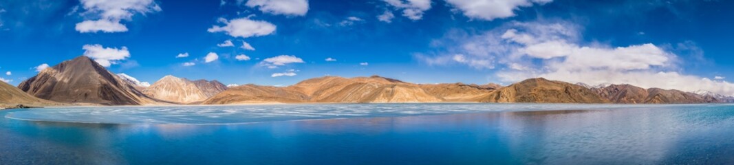 Fototapeta na wymiar Pangong Lake the world's highest salt water lake in Ladakh, Jammu and Kashmir ; extends from India to the Tibetan Autonomous Region, China