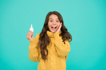 Seasonal allergy. Kid use effective medicines. Girl hold nasal drops. Allergy concept. Home treatment. Nasal drops plastic bottle. Effective nasal spray. Runny nose and other symptoms of cold