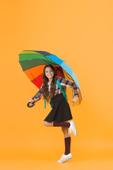 Enjoying autumn day. color up life. go to school. good weather forecast. under my umbrella. small girl bright parasol. fall style. stay positive any season. happy child protected rain. rainbow colors