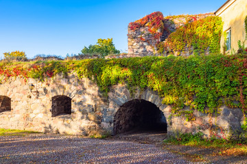 Finland. Helsinki. Suomenlinna on a sunny day. Fort Sveaborg fortress. Arch in the fortifications of the fortress. Helsinki landmarks. Museum The streets of the island. Suomi. Finnish fortress.