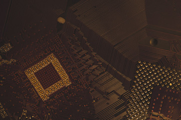 Processor pins macro. computer motherboard close up. cpu pins on a circuit board. computer central...