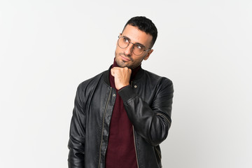 Young man over isolated white background with glasses