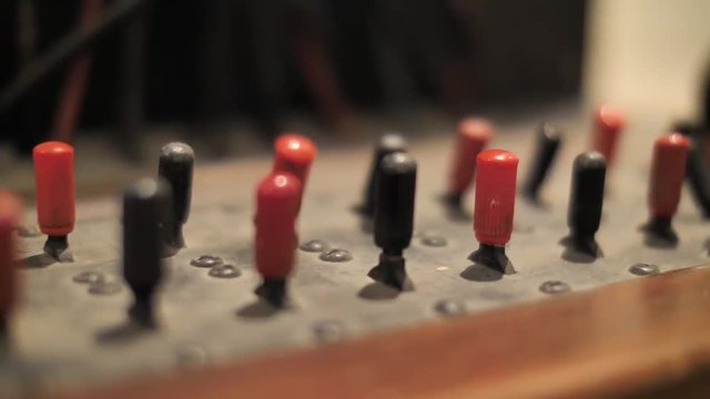 Switching commutators on old fashioned telephone exchange switchboard