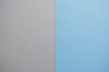 blue an gray paper, two tone background