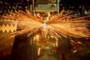 CNC Laser cutting of metal, modern industrial technology.