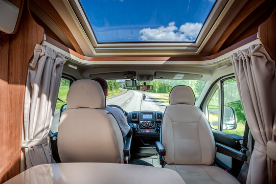 Man Driving On A Road In The Camper Van RV