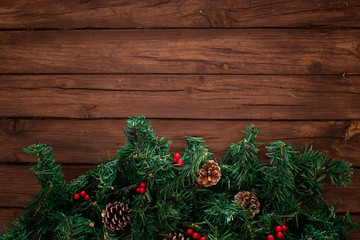 Fototapeta na wymiar Composición con elementos de la navidad sobre fondo de madera