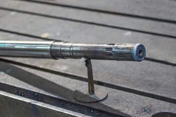 Shaft with weld metal to restore splines.