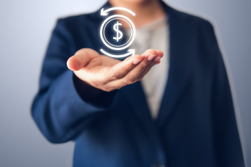 Business Finance Investment and Stock Market Concept, Businesswoman Holding Dollar Money Currency Symbol for Financial Exchange Management. Money Transfer and Electronic Banking Service