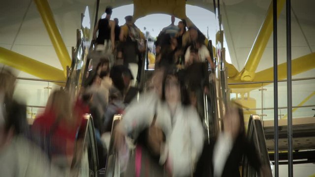 HDR time lapse shot flow of people passing in a mall. 4K