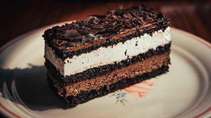 Cherry Chocolate Cake decorated with chocolate shavings on the top