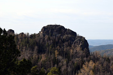 Fototapeta na wymiar Panoramic views of the mountains and forest. Beautiful majestic rocks.