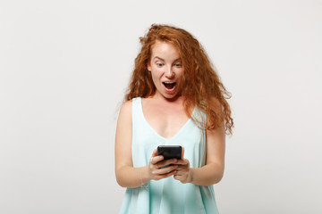 Young shocked redhead woman girl in casual light clothes posing isolated on white background,...