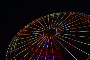 Ferris wheel in the amusement Park. Dark night.
