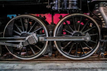 Fototapeta na wymiar Old Iron Wheels on an Antique Train