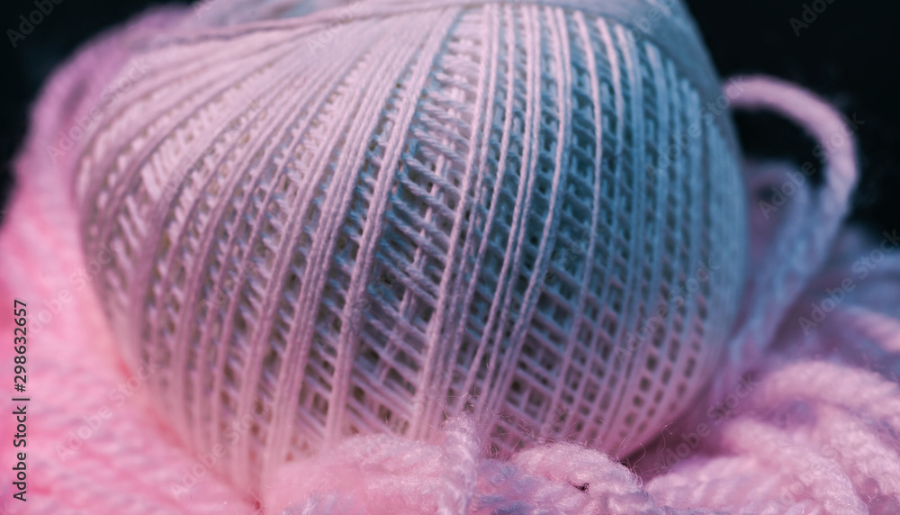 Poster close up beautiful tangle of thread in red and blue light on a dark background. macro photography vi