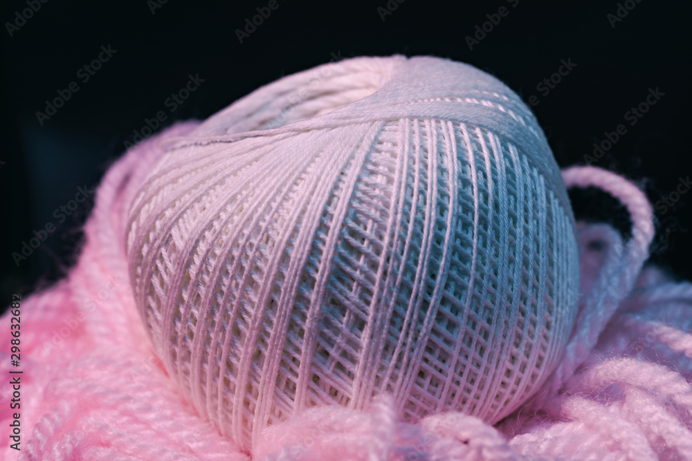Poster close up beautiful tangle of thread in red and blue light on a dark background. macro photography vi