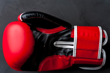 Close-up of a beautiful red-black boxing glove