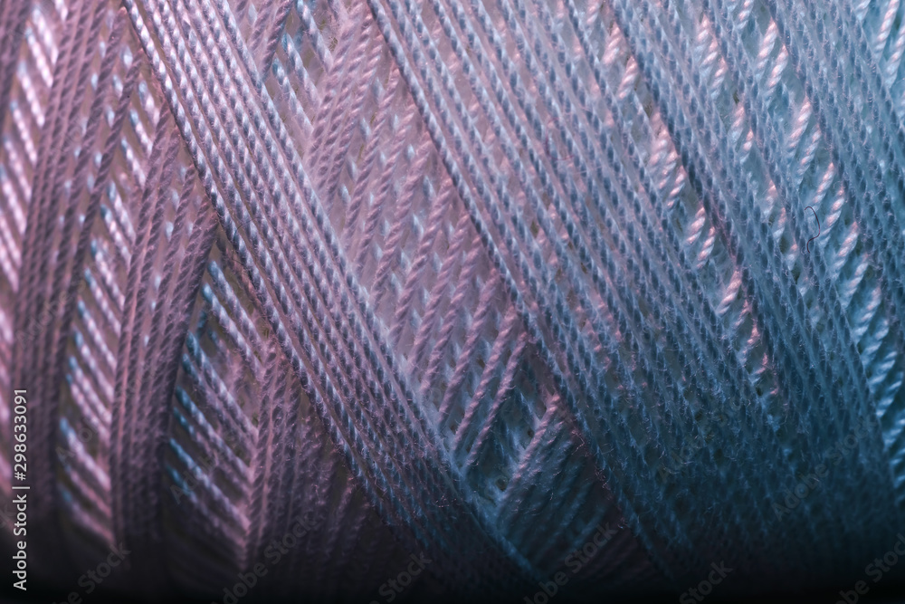 Poster close up beautiful white thread in red and blue light background texture. macro photography view.