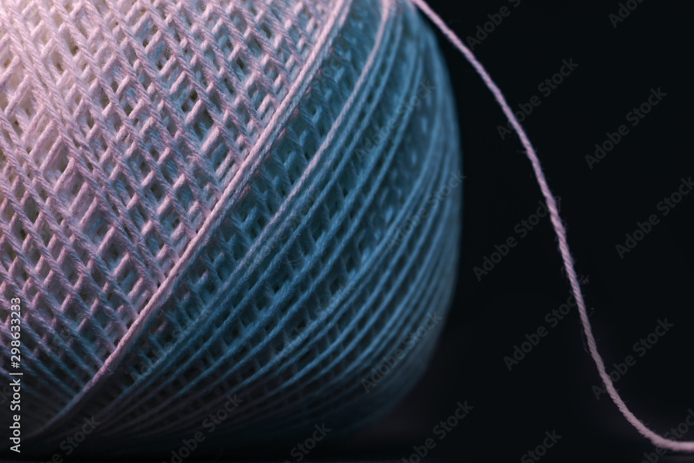 Aufkleber close up beautiful tangle of thread in red and blue light background texture. macro photography view