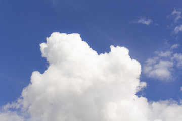 White cumulus clouds in blue sky at daytime. Natural background photo texture