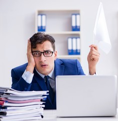 Businessman throwing white flag and giving up