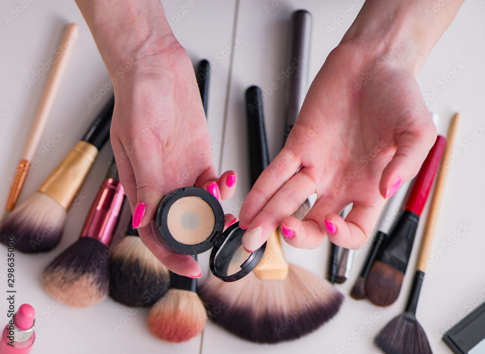 Wall mural collection of make up products displayed on the table