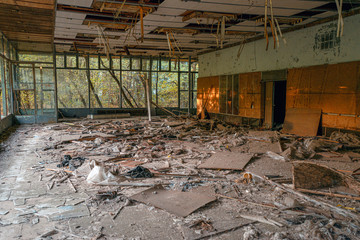 Obraz na płótnie Canvas interior of an abandoned grocery store in the city of Pripyat in the Chernobyl exclusion zone. Everything was looted after the Chernobyl disaster