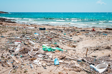 Plastic objects such as bottles, wrappers and balloons on a beach in the Mediterranean Sea, at the Aegean sea of ​​Greece, are already visible environmental pollution. There was no Beach Clean Up here
