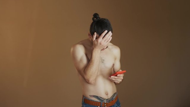 Guy Mexican On Wall Background. Guy With Naked Torso.