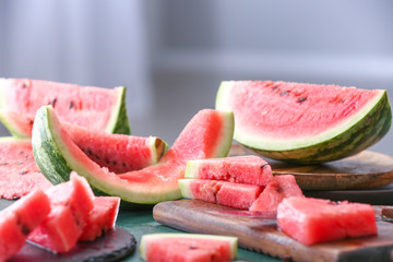 Ripe cut watermelon on table