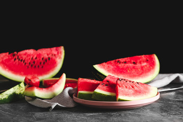 Sweet cut watermelon on dark background