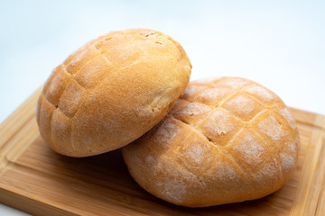 bread, fresh loaves in the foreground