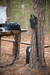 Movie equipment is standing in the forest