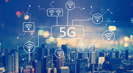 5G network with aerial view of city skylines at night