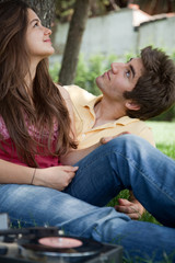 Young romantic couple together in the park