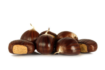 Sweet edible chestnuts isolated on white background