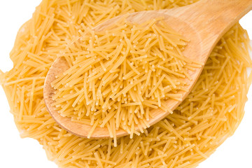 Wooden cooking spoons filled with noodle 