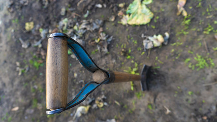 a shovel digging ground close-up