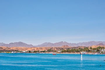 Fototapeta premium Beautiful view of sea cost against blue sky