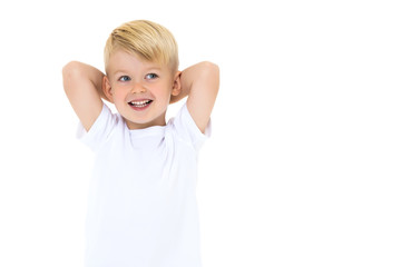 Emotional little boy in a pure white t-shirt.