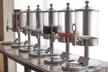 Row of fresh juice at buffet restaurant