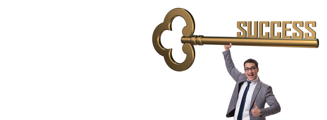 Businessman with key to success business concept
