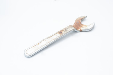 rusty wrench isolated on a white background