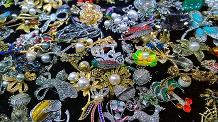 Handmade jewelry for women and girls from beads, pearls, silver and gold, artificial stones on a...